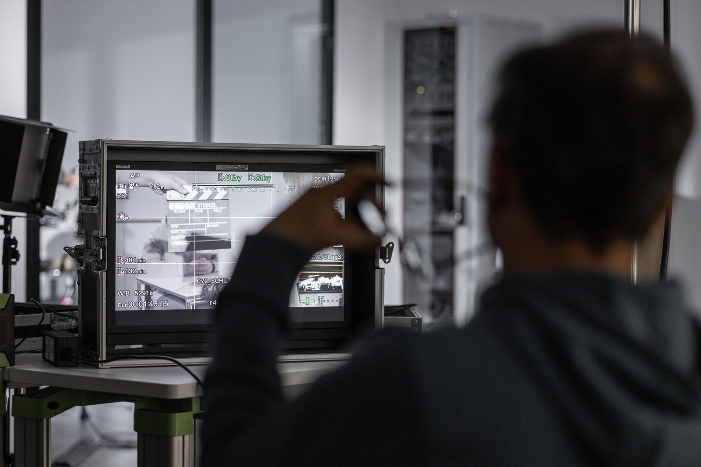 Director's monitor showing a slate