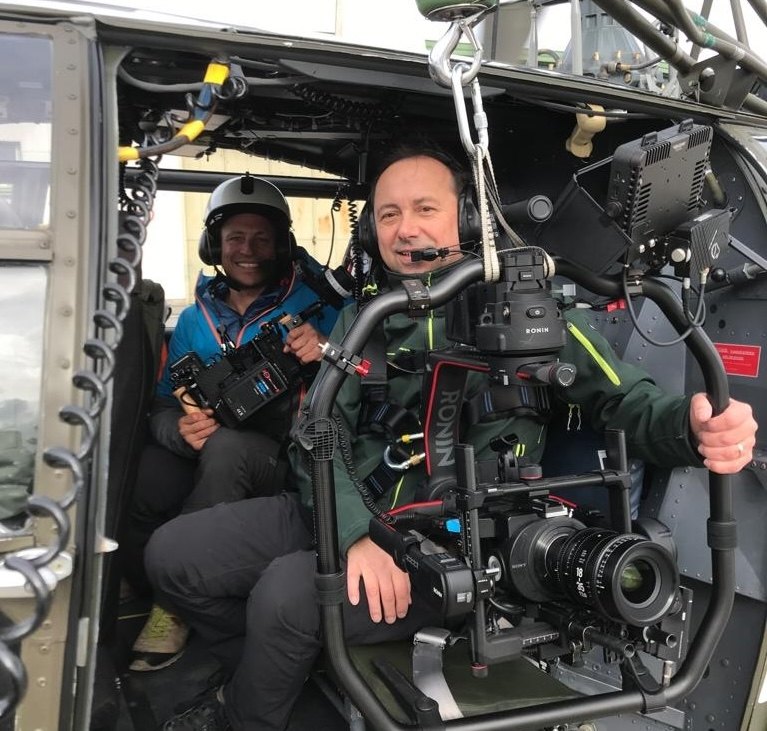 Lothar Riedl shooting from a helicopter